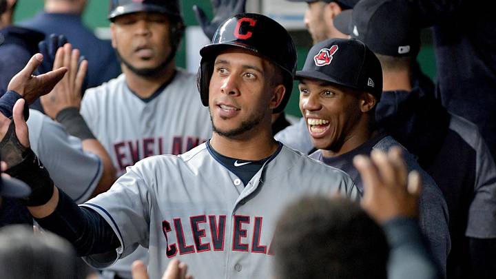 Sep 29, 2018; Kansas City, MO, USA; Cleveland Indians left fielder Michael Brantley (23) celebrates in the dugout after scoring in the first inning against the Kansas City Royals at Kauffman Stadium. 