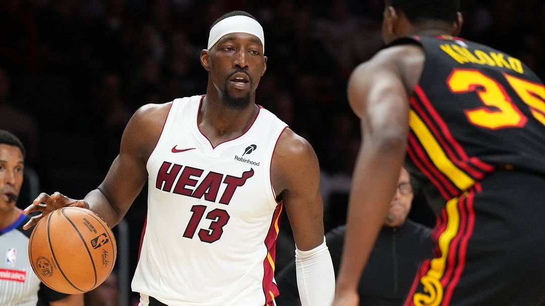 Apr 12, 2026; Miami, Florida, USA; Miami heat forward Bam Adebayo (13) dribbles against Atlanta Hawks center Christian Koloko (35) during the second half at Kaseya Center. Mandatory Credit: Jim Rassol-Imagn Images Apr 12, 2026; Miami, Florida, USA; Miami heat forward Bam Adebayo (13) dribbles against Atlanta Hawks center Christian Koloko (35) during the second half at Kaseya Center. Mandatory Credit: Jim Rassol-Imagn Images