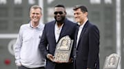 May 27, 2022; Boston, Massachusetts, USA; Boston Red Sox president Sam Kennedy and chief baseball officer Chaim Bloom honor former player David Ortiz into the Red Sox Hall of Fame prior to a game against the Baltimore Orioles at Fenway Park. Mandatory Credit: Bob DeChiara-Imagn Images