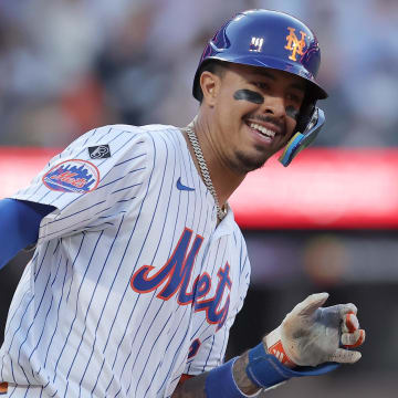 Jun 25, 2024; New York City, New York, USA; New York Mets third baseman Mark Vientos (27) rounds the bases after hitting a solo home run against the New York Yankees during the second inning at Citi Field.