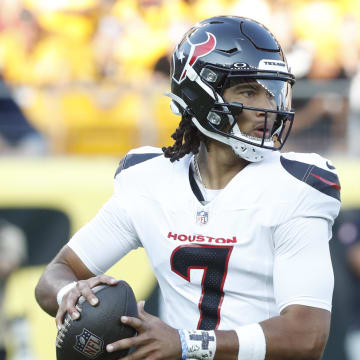 Aug 9, 2024; Pittsburgh, Pennsylvania, USA;  Houston Texans quarterback C.J. Stroud (7) passes against the Pittsburgh Steelers during the first quarter at Acrisure Stadium. Mandatory Credit: Charles LeClaire-USA TODAY Sports