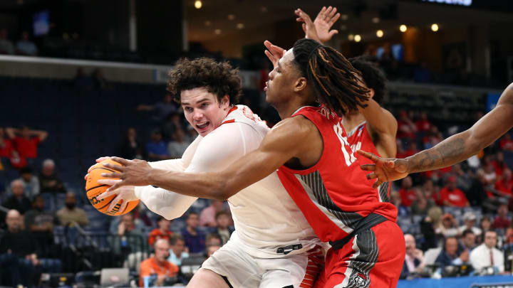 Mar 22, 2024; Memphis, TN, USA; Clemson Tigers forward Ian Schieffelin (4) drives to the basket as New Mexico Lobos forward JT Toppin (15) defends during the second half in the NCAA Tournament First Round at FedExForum. Mandatory Credit: Petre Thomas-USA TODAY Sports