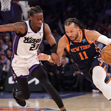 Apr 4, 2024; New York, New York, USA; New York Knicks guard Jalen Brunson (11) drives to the basket against Sacramento Kings guard Keon Ellis (23) during the first quarter at Madison Square Garden. Mandatory Credit: Brad Penner-Imagn Images