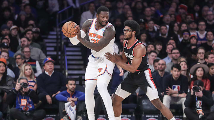 Jan 9, 2024; New York, New York, USA; New York Knicks forward Julius Randle (30) looks to post up against Portland Trail Blazers guard Scoot Henderson (00) in the first quarter at Madison Square Garden. Mandatory Credit: Wendell Cruz-Imagn Images