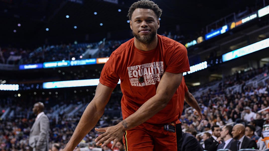 Former Atlanta Hawks guard Justin Anderson (1) reacts from the bench in the second half against the Phoenix Suns at Talking Stick Resort Arena.