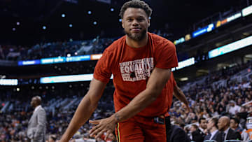 Former Atlanta Hawks guard Justin Anderson (1) reacts from the bench in the second half against the Phoenix Suns at Talking Stick Resort Arena.