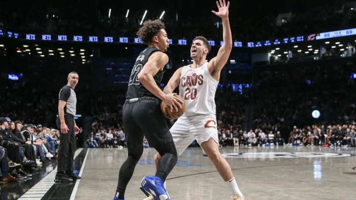 Feb 8, 2024; Brooklyn, New York, USA; Brooklyn Nets forward Jalen Wilson (22) is guarded by Cleveland Cavaliers forward Georges Niang (20) in the third quarter at Barclays Center. Mandatory Credit: Wendell Cruz-USA TODAY Sports