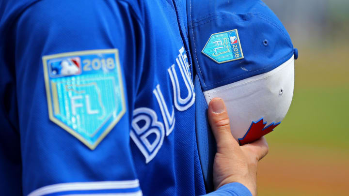 Mar 25, 2018; Dunedin, FL, USA; A view of the Florida Spring Training logo on the New Era hat held by a member of the Toronto Blue Jays prior to the game against the Pittsburgh Pirates at Florida Auto Exchange Stadium. Mandatory Credit: Aaron Doster-USA TODAY Sports
