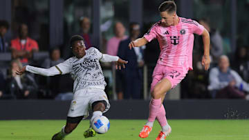 Mar 6, 2025; Ft. Lauderdale, Florida, USA; Cavalier FC midfielder Christopher Ainsworth, left, defends against Inter Miami CF forward Tadeo Allende during the first half at Chase Stadium. Mandatory Credit: Sam Navarro-Imagn Images