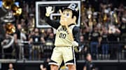 The Purdue Boilermakers mascot Purdue Pete dances 