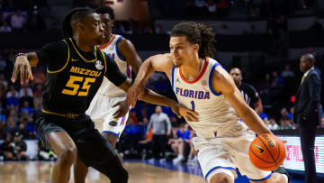 Florida Gators guard Walter Clayton Jr. (1) dribbles during the first half. The Florida men   s