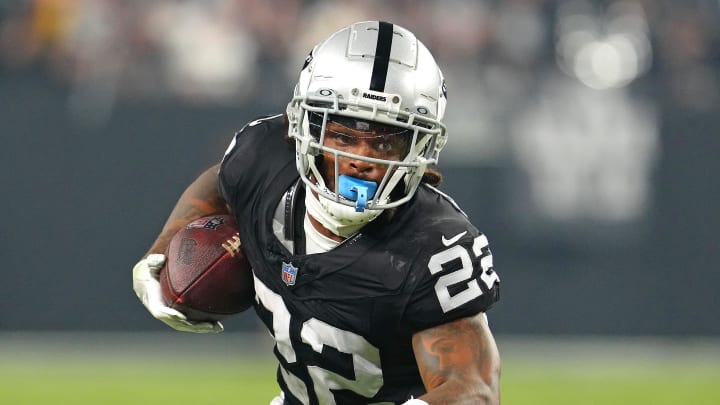 Sep 24, 2023; Paradise, Nevada, USA; Las Vegas Raiders running back Ameer Abdullah (22) rushes against the Pittsburgh Steelers during the third quarter at Allegiant Stadium. Mandatory Credit: Stephen R. Sylvanie-USA TODAY Sports