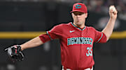 Apr 11, 2025; Phoenix, Arizona, USA; Arizona Diamondbacks pitcher Joe Mantiply (35) throws in the ninth inning against the Milwaukee Brewers at Chase Field. Mandatory Credit: Matt Kartozian-Imagn Images