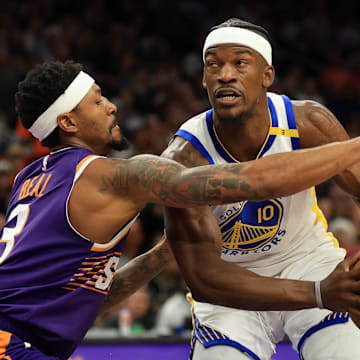 Apr 8, 2025; Phoenix, Arizona, USA; Golden State Warriors forward Jimmy Butler III (10) drives to the basket against Phoenix Suns guard Bradley Beal (3) during the first half at Footprint Center. Mandatory Credit: Mark J. Rebilas-Imagn Images