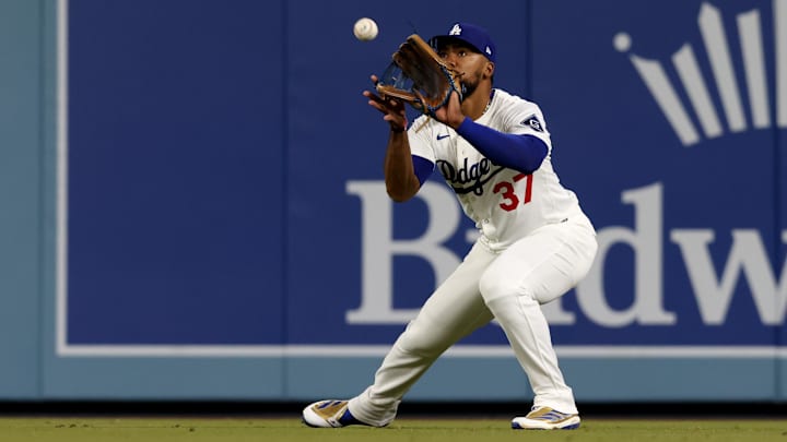 Apr 28, 2025; Los Angeles, California, USA; Los Angeles Dodgers outfielder Teoscar Hernandez (37) makes a catch during the eighth inning against the Miami Marlins at Dodger Stadium. Mandatory Credit: Jason Parkhurst-Imagn Images