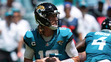 Sep 8, 2024; Miami Gardens, Florida, USA;  Jacksonville Jaguars quarterback Trevor Lawrence (16) drops back to pass against the Miami Dolphins in the first quarter at Hard Rock Stadium. Mandatory Credit: Jim Rassol-Imagn Images