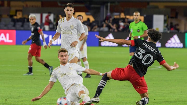 Kevin Paredes of DC United and Brooks Lennon of Atlanta... Kevin Paredes of DC United and Brooks Lennon of Atlanta...