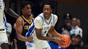 Feb 12, 2025; Durham, North Carolina, USA; Duke Blue Devils forward Isaiah Evans (3) controls the ball in front of California Golden Bears guard Jeremiah Wilkinson (0) during the second half at Cameron Indoor Stadium. Mandatory Credit: Rob Kinnan-Imagn Images