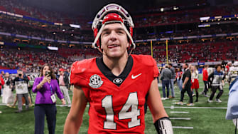 Nov 28, 2025; Atlanta, Georgia, USA; Georgia Bulldogs quarterback Gunner Stockton (14) celebrates after a victory over the Georgia Tech Yellow Jackets at Mercedes-Benz Stadium. Mandatory Credit: Brett Davis-Imagn Images