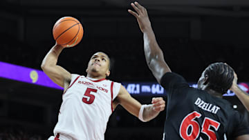 Arkansas Razorbacks guard Darius Acuff Jr (5) goes up for a dunk during the second half against the Cincinnati Bearcats at Bud Walton Arena. Arkansas won 89-61. 