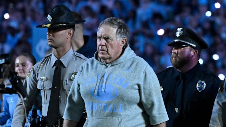 North Carolina Tar Heels head coach Bill Belichick walks on to the field before the game at Kenan Stadium. North Carolina Tar Heels head coach Bill Belichick walks on to the field before the game at Kenan Stadium.