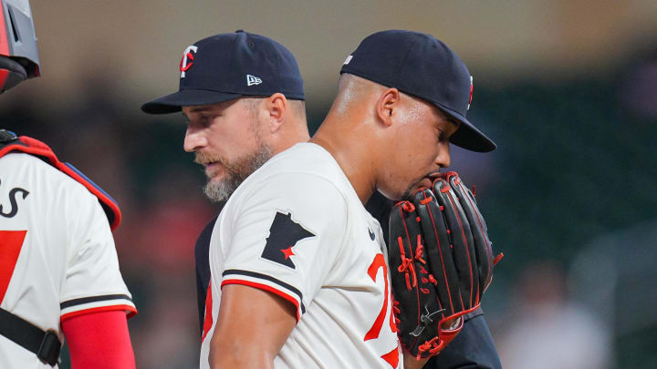 Aug 27, 2024; Minneapolis, Minnesota, USA; Minnesota Twins pitcher Jhoan Duran (59) is pulled from the game against the Atlanta Braves in the tenth inning at Target Field. Mandatory Credit: Brad Rempel-USA TODAY Sports