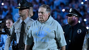 North Carolina Tar Heels head coach Bill Belichick walks on to the field before the game at Kenan Stadium.