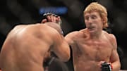 Dec 10, 2022; Las Vegas, Nevada, USA; Paddy Pimblett (red gloves) fights Jared Gordon (blue gloves) during UFC 282 at T-Mobile Arena. Mandatory Credit: Stephen R. Sylvanie-Imagn Images