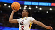 Apr 4, 2025; Tampa, FL, USA;  South Carolina Gamecocks guard MiLaysia Fulwiley (12) drives to the basket against the Texas Longhorns during the third quarter in a semifinal of the women's 2025 NCAA tournament at Amalie Arena. Mandatory Credit: Nathan Ray Seebeck-Imagn Images