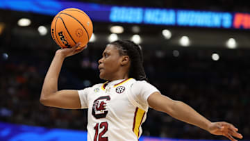 Apr 4, 2025; Tampa, FL, USA;  South Carolina Gamecocks guard MiLaysia Fulwiley (12) drives to the basket against the Texas Longhorns during the third quarter in a semifinal of the women's 2025 NCAA tournament at Amalie Arena. Mandatory Credit: Nathan Ray Seebeck-Imagn Images