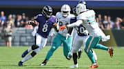 Sep 18, 2022; Baltimore, Maryland, USA; Baltimore Ravens quarterback Lamar Jackson (8) runs during the first half against the Miami Dolphins at M&T Bank Stadium. Mandatory Credit: Tommy Gilligan-Imagn Images