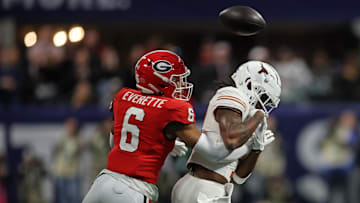 Dec 7, 2024; Atlanta, GA, USA; Georgia Bulldogs defensive back Daylen Everette (6) breaks up a pass intended for Texas Longhorns wide receiver Isaiah Bond (7) during the first half in the 2024 SEC Championship game at Mercedes-Benz Stadium. Mandatory Credit: Brett Davis-Imagn Images