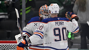 May 23, 2025; Dallas, Texas, USA; Edmonton Oilers right wing Corey Perry (90) and goaltender Stuart Skinner (74)  react after defeating the Dallas Stars in game two of the Western Conference Final of the 2025 Stanley Cup Playoffs 