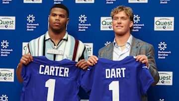 Apr 25, 2025; East Rutherford, NJ, US; New York Giants first-round draft picks, Abdul Carter and Jaxson Dart, pose for photos prior to the start of the press conference.   