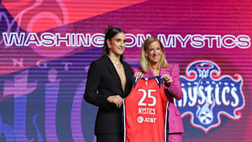 Apr 14, 2025; New York, New York, USA; Sonia Citron poses with WNBA commissioner Cathy Engelbert after being selected with the number three overall pick to the Washington Mystics in the 2025 WNBA Draft at The Shed at Hudson Yards. Mandatory Credit: Vincent Carchietta-Imagn Images