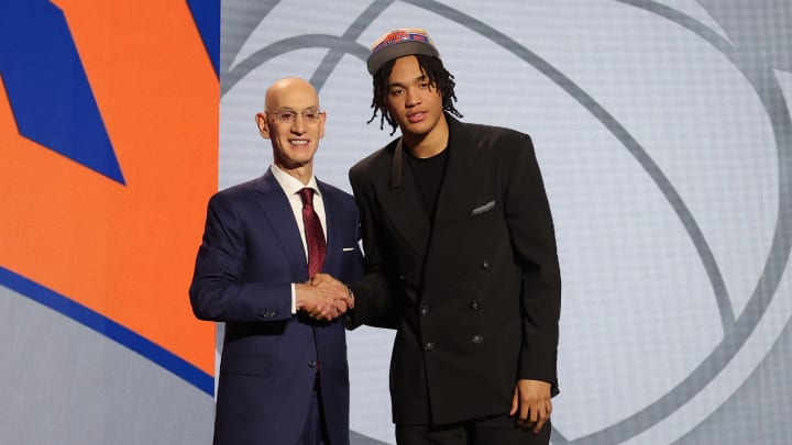 Jun 26, 2024; Brooklyn, NY, USA; Pacome Dadiet poses for photos with NBA commissioner Adam Silver after being selected in the first round by the New York Knicks in the 2024 NBA Draft at Barclays Center. Mandatory Credit: Brad Penner-USA TODAY Sports