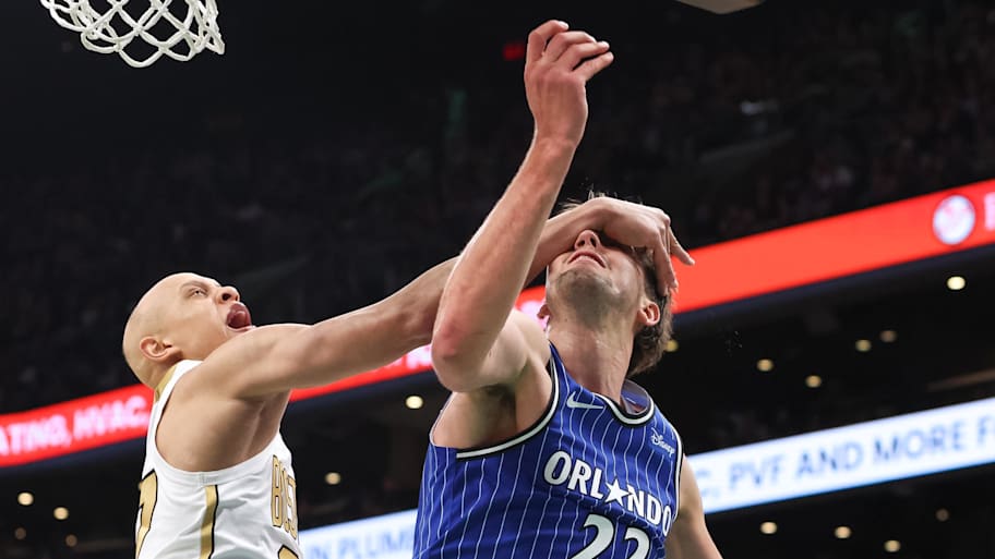Boston Celtics forward Jordan Walsh fouls Orlando Magic forward Franz Wagner.