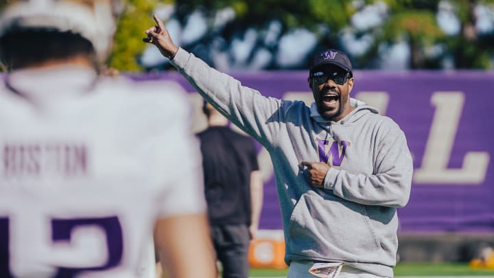 Receivers coach Kevin Cummings makes his point in spring ball. 