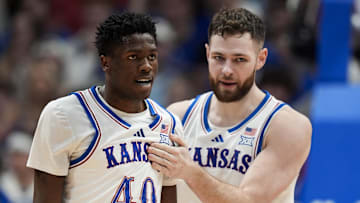 Kansas Jayhawks forward Flory Bidunga (40) and center Hunter Dickinson (1)