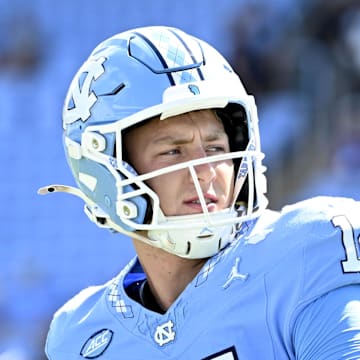 Sep 13, 2025; Chapel Hill, North Carolina, USA; North Carolina Tar Heels quarterback Max Johnson (14) passes before the game at Kenan Stadium. Mandatory Credit: Bob Donnan-Imagn Images