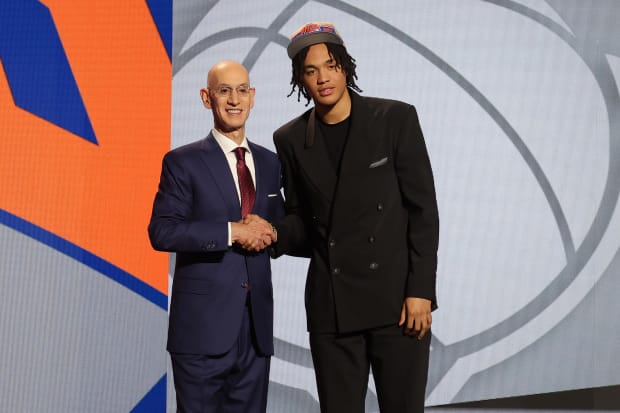 Adam Silver and Pacome Dadiet