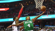 May 7, 2017; Washington, DC, USA; Boston Celtics guard Isaiah Thomas (4) shoots a layup as Washington Wizards guard John Wall (2) defends during the second quarter in game four of the second round of the 2017 NBA Playoffs at Verizon Center. Mandatory Credit: Brad Mills-USA TODAY Sports