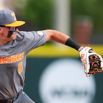 Tennessee's Gavin Kilen (6) throws to first during game one of the NCAA baseball tournament Fayetteville Super Regional between Tennessee and Arkansas held at Baum-Walker Stadium on Saturday, June 7, 2025.