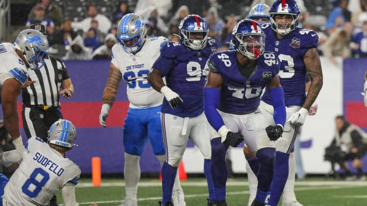 Aug 8, 2024; East Rutherford, New Jersey, USA;  New York Giants linebacker Benton Whitley (48) celebrates a sack of Detroit Lions quarterback Nate Sudfeld (8) at MetLife Stadium. Mandatory Credit: Scott Rausenberger-USA TODAY Sports