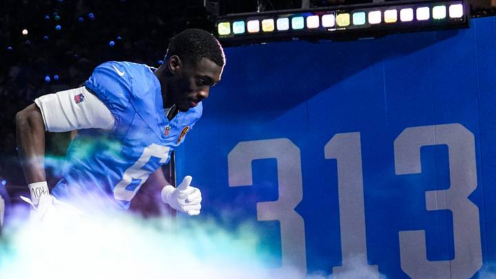 Detroit Lions cornerback Terrion Arnold runs onto the field during player introductions before the Thanksgiving game against Green Bay Packers at Ford Field in Detroit on Thursday, Nov. 27, 2025.