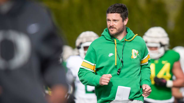 Oregon head coach Dan Lanning runs during practice with the Ducks Thursday, April 11, 2024, at the Hatfield-Dowlin Complex