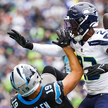 Sep 24, 2023; Seattle, Washington, USA; Seattle Seahawks cornerback Artie Burns (23) defends a pass intended for Carolina Panthers wide receiver Adam Thielen (19) during the second quarter at Lumen Field. Mandatory Credit: Joe Nicholson-Imagn Images