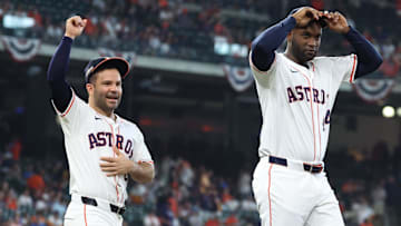 Oct 1, 2024; Houston, Texas, USA; Houston Astros second baseman Jose Altuve (27) and Houston Astros outfielder Yordan Alvarez (44) warm up before playing against the Detroit Tigers in game one of the Wild Card round for the 2024 MLB Playoffs at MinuMandatory Credit: Troy Taormina-Imagn Images