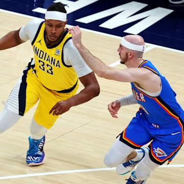 Jun 11, 2025; Indianapolis, Indiana, USA; Indiana Pacers center Myles Turner (33) shoots the ball against Oklahoma City Thunder guard Alex Caruso (9) during the first quarter in game three of the 2025 NBA Finals at Gainbridge Fieldhouse. Mandatory Credit: Trevor Ruszkowski-Imagn Images