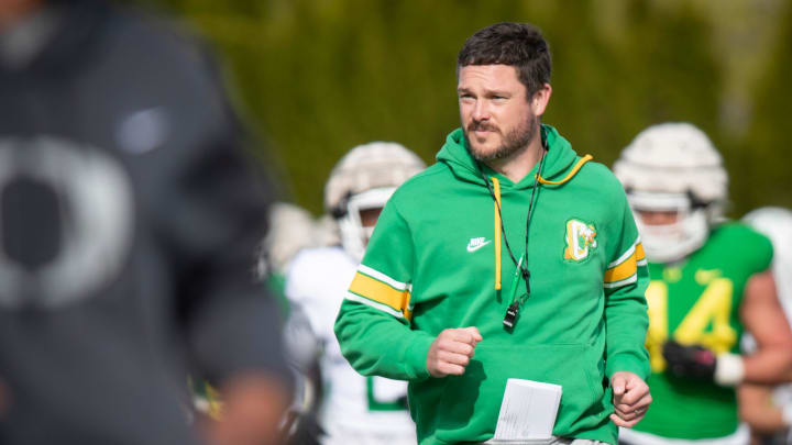 Oregon head coach Dan Lanning runs during practice with the Ducks Thursday, April 11, 2024, at the Hatfield-Dowlin Complex in Eugene, Ore.